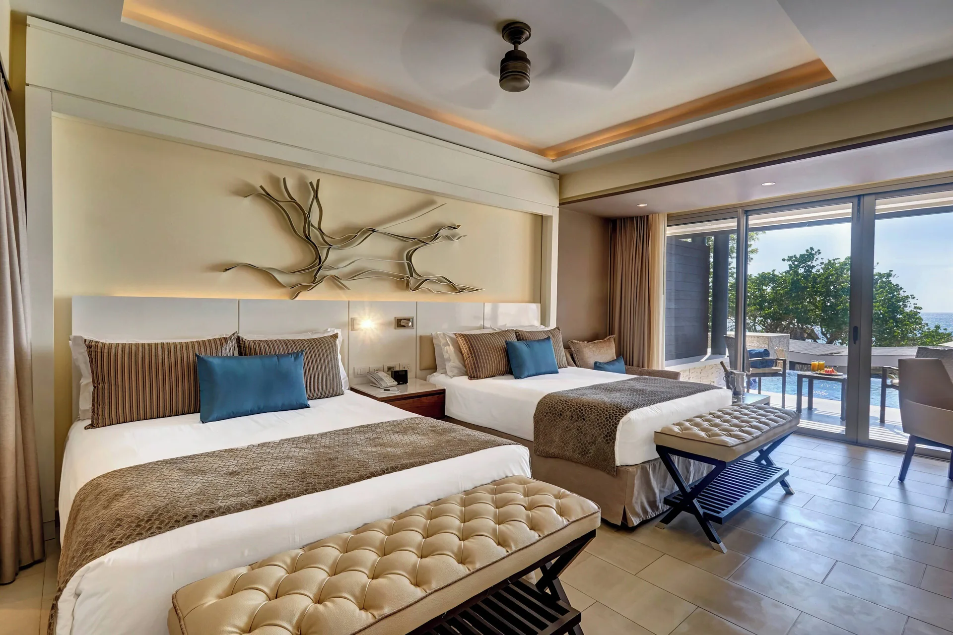 Sunset Swim Out Suite with two beds and terrace view at Grand Lido Negril Au-Naturel.