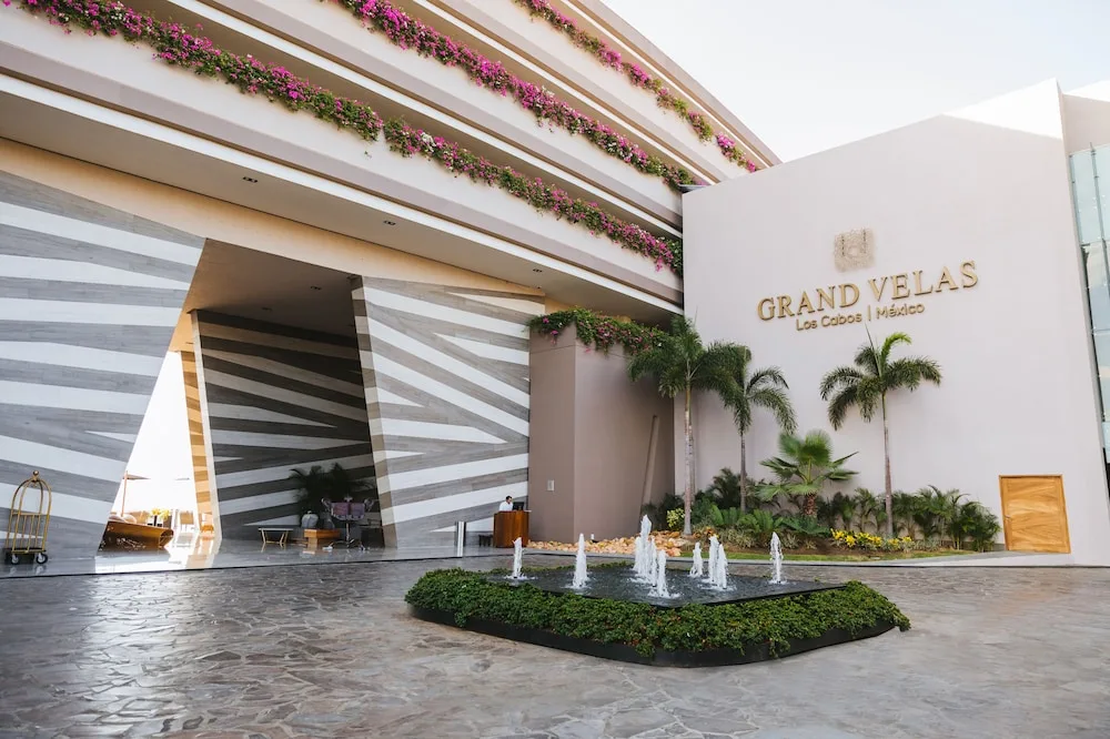 The entrance drive, fountain, and hotel sign at Grand Velas Los Cabos.