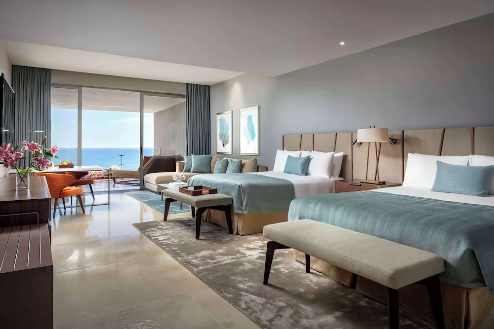 Ambassador Suite Ocean View with two beds and balcony at Grand Velas Los Cabos.