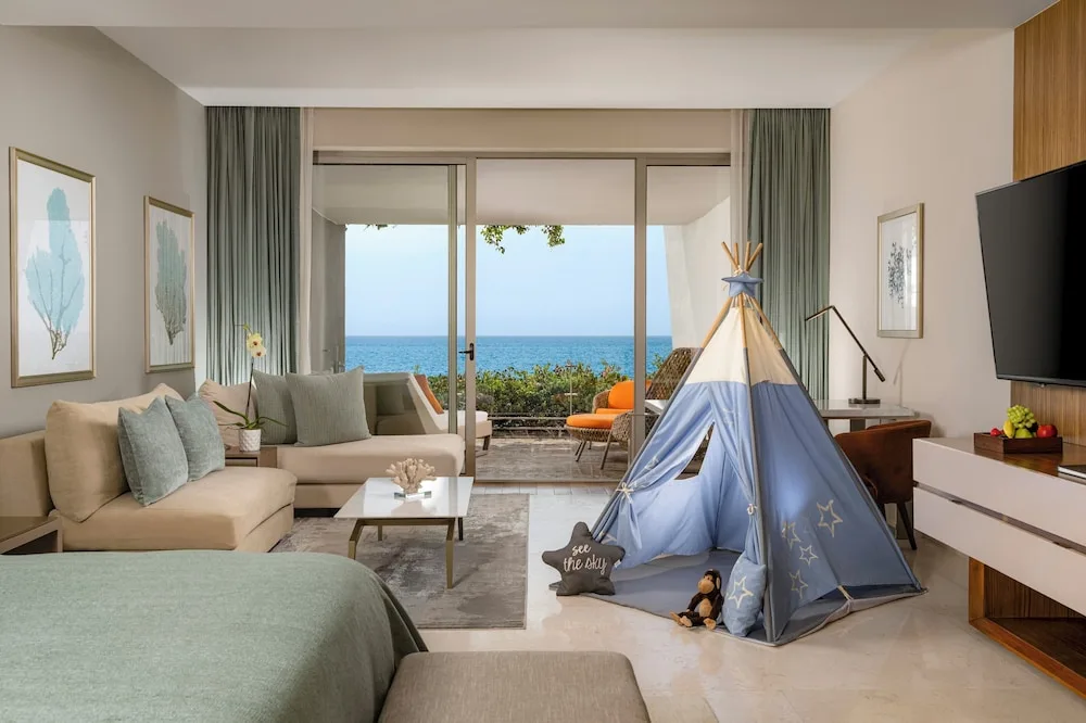 Ambassador Two Bedroom Family Suite with kids' tent and ocean view at Grand Velas Los Cabos.