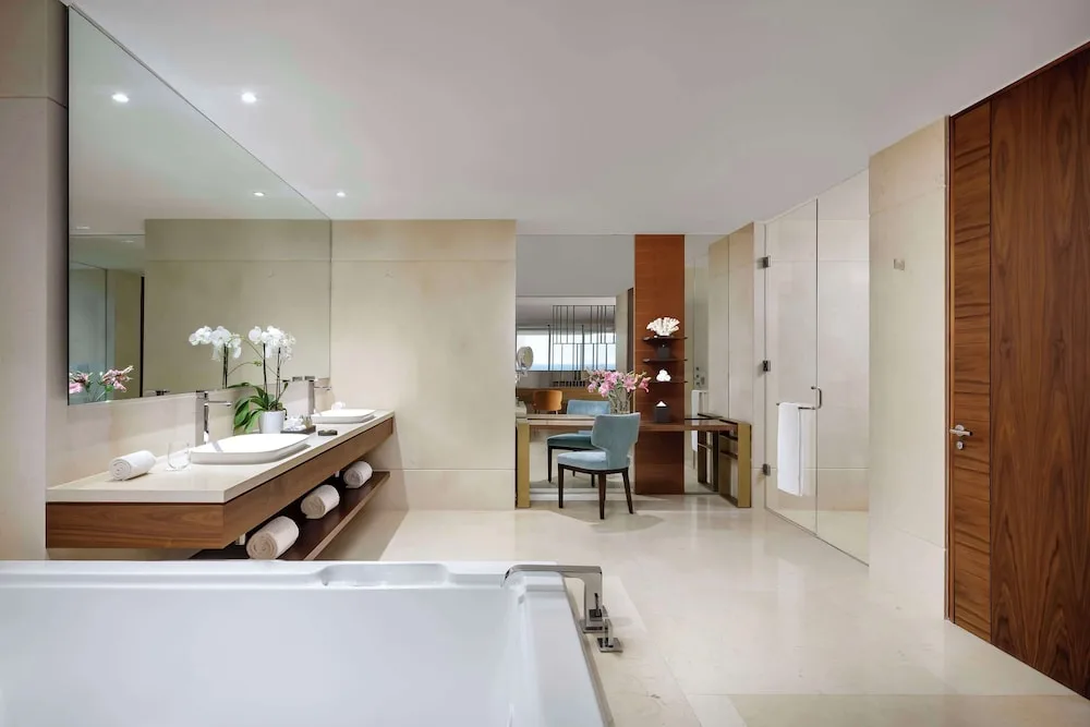 Grand Class Suite Ocean Front bathroom with tub and double vanity at Grand Velas Los Cabos.