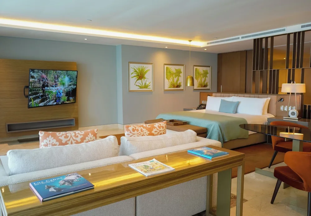 Grand Class Suite Ocean Front bedroom and sitting area at Grand Velas Los Cabos.