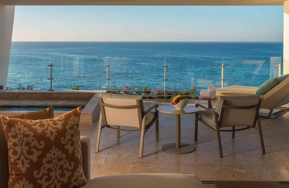 Grand Class Suite Ocean Front terrace seating with ocean view at Grand Velas Los Cabos.