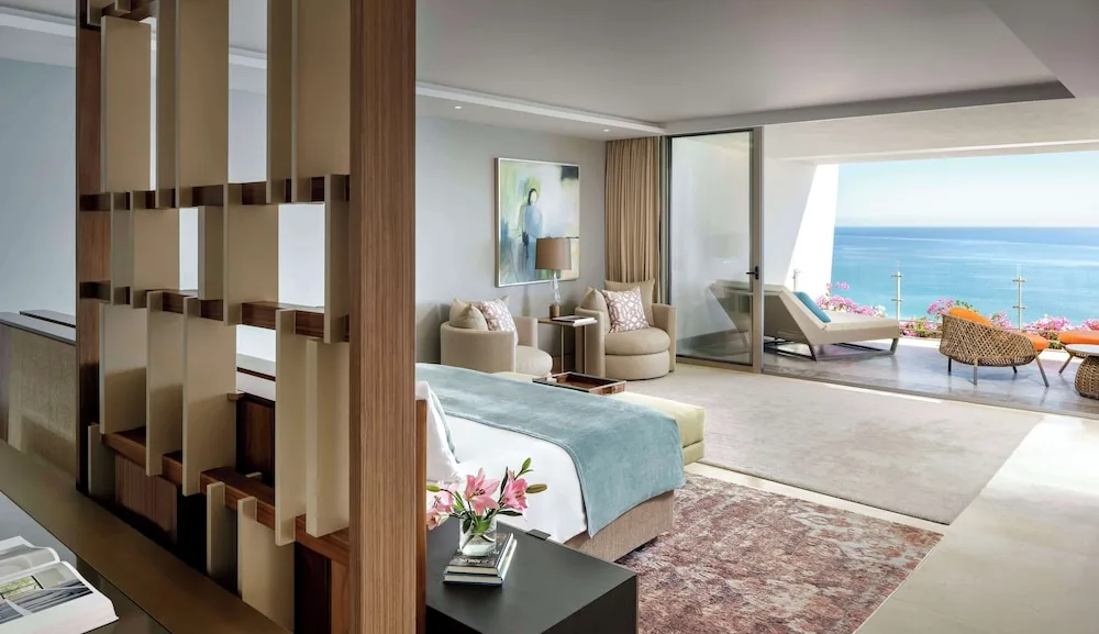 One Bedroom Governor Suite with king bed and oceanfront terrace at Grand Velas Los Cabos.