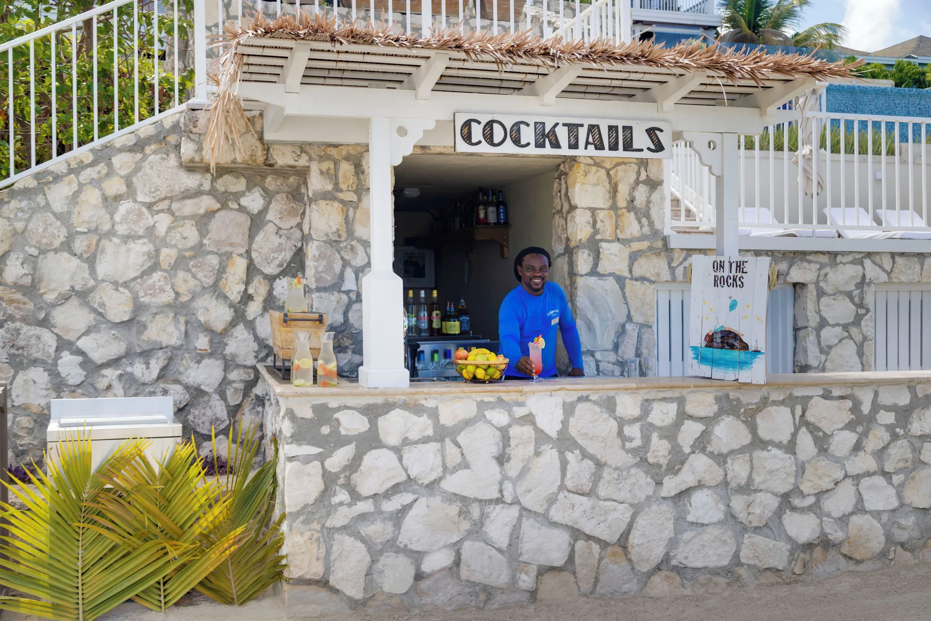 Bartender at the On the Rocks cocktail bar at Hammock Cove Antigua.