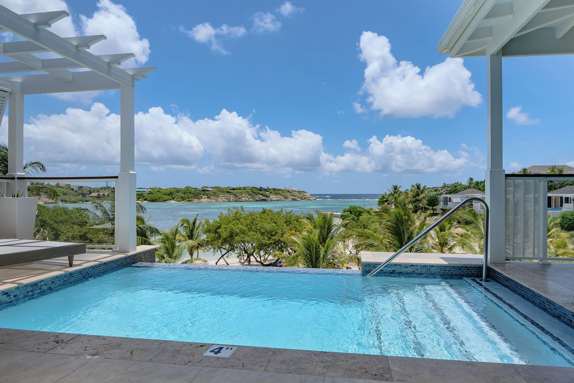 Signature Villa plunge pool with ocean and palm views at Hammock Cove Antigua.