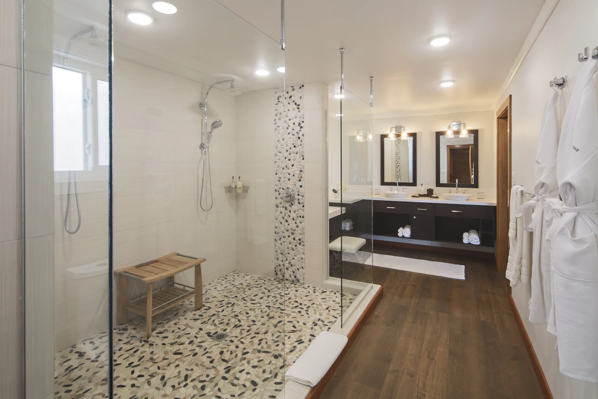Waterfront Villa bathroom with glass shower and double vanity at Hammock Cove Antigua.