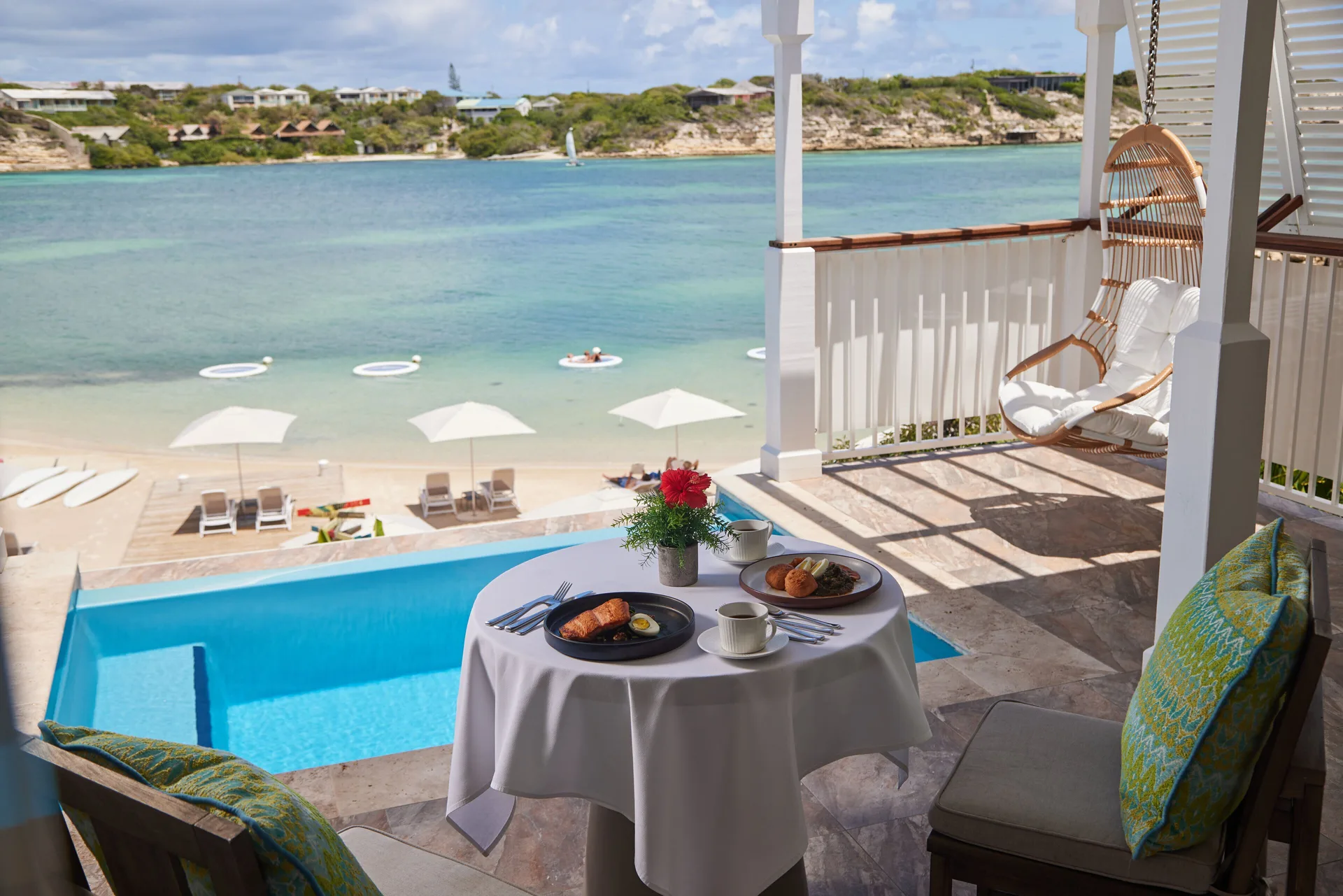 Waterfront Villa terrace breakfast by plunge pool at Hammock Cove Antigua.