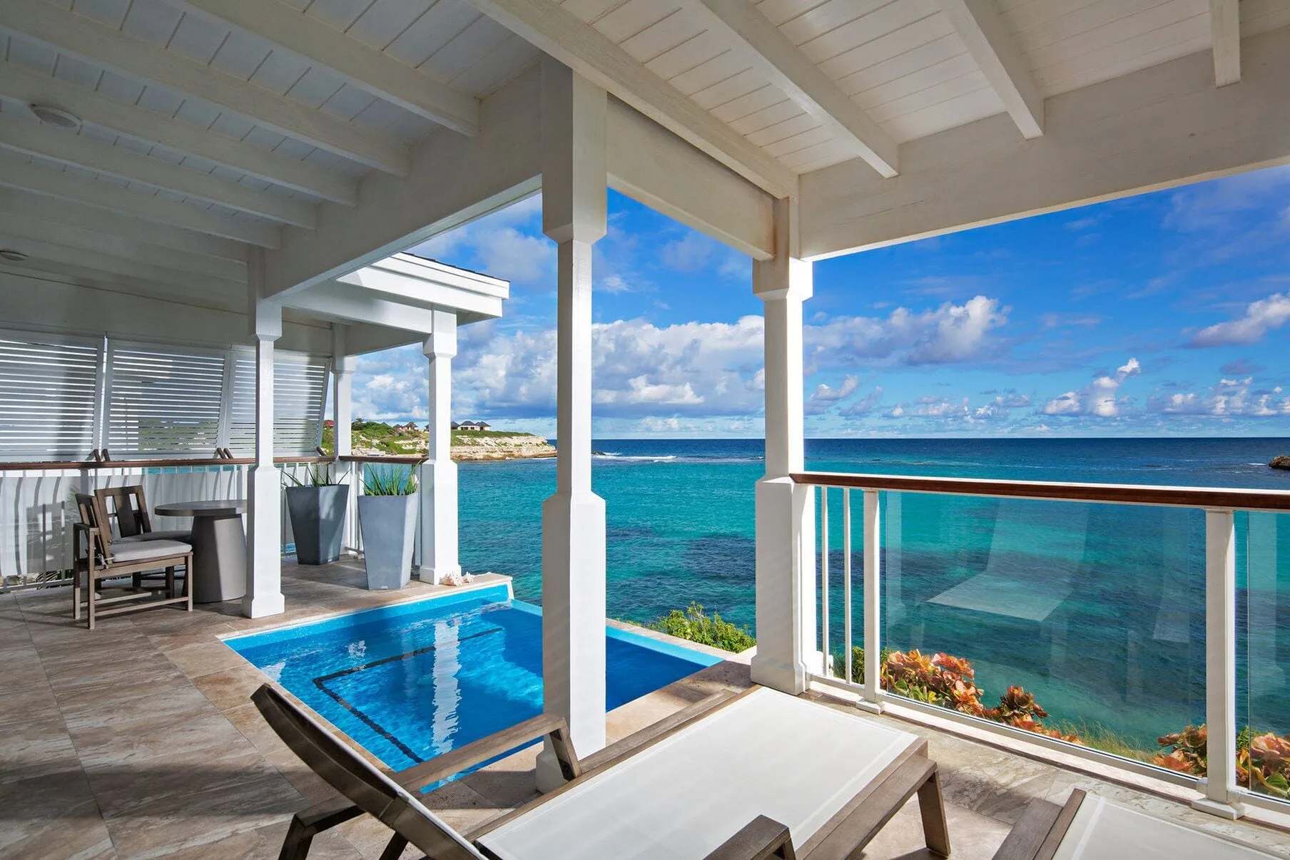 Waterfront Villa terrace with plunge pool and ocean view at Hammock Cove Antigua.