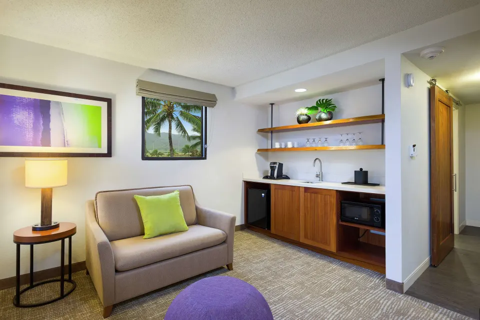 Junior Suite Ocean View sitting area and wet bar at Hilton Garden Inn Kauai Wailua Bay.