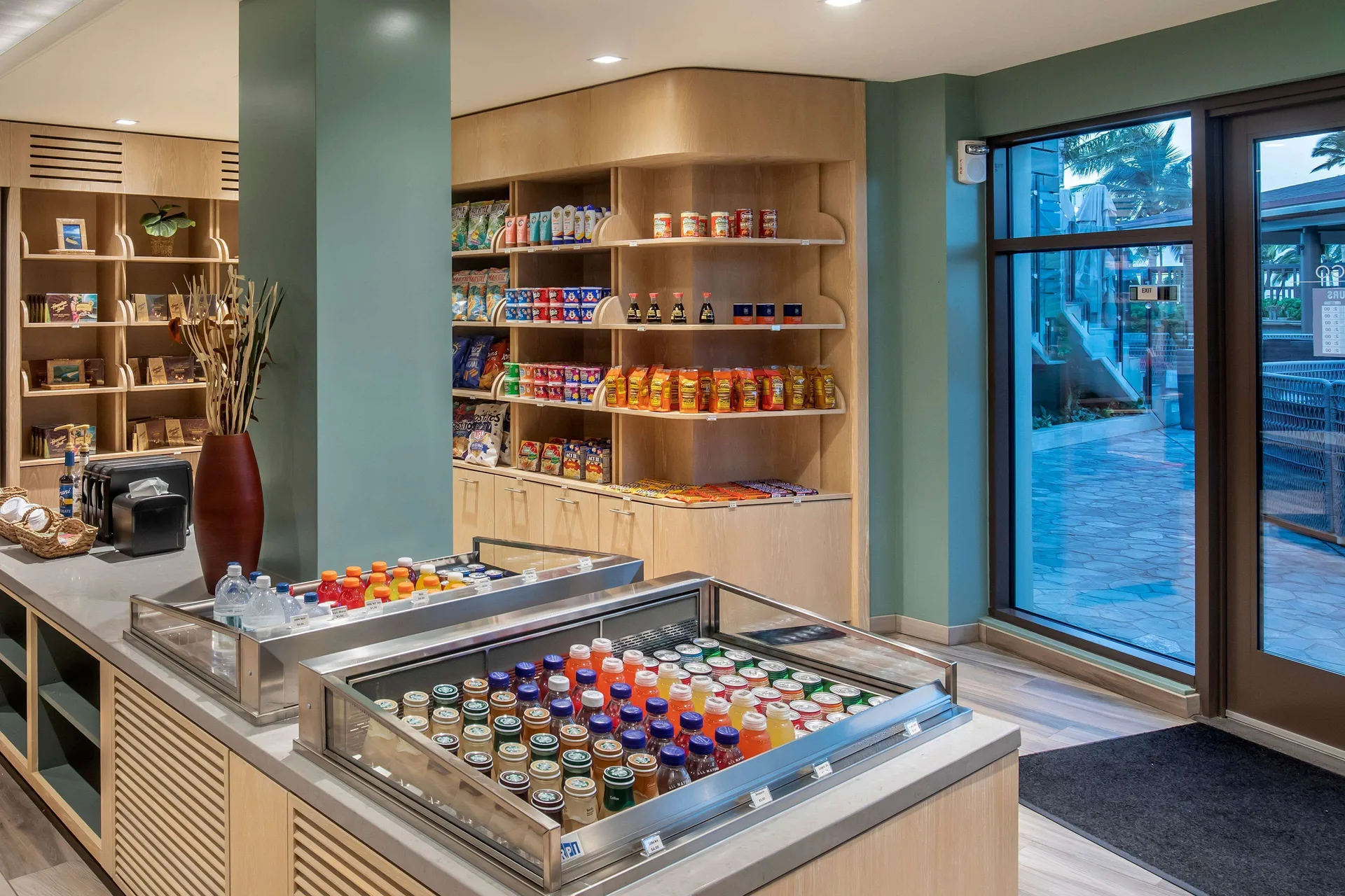 Marketplace with drinks, snacks, and retail shelves at Hilton Grand Vacations Club Maui Bay Villas.