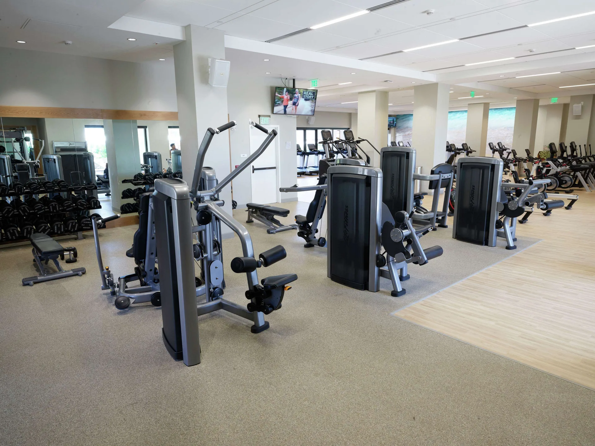 Fitness center weight machines and free weights at Hilton Hawaiian Village Waikiki Beach Resort.