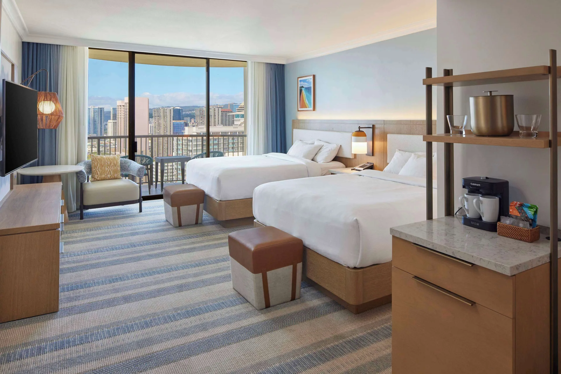 Renovated Ocean View room with two beds and balcony at Hilton Hawaiian Village Waikiki Beach Resort.