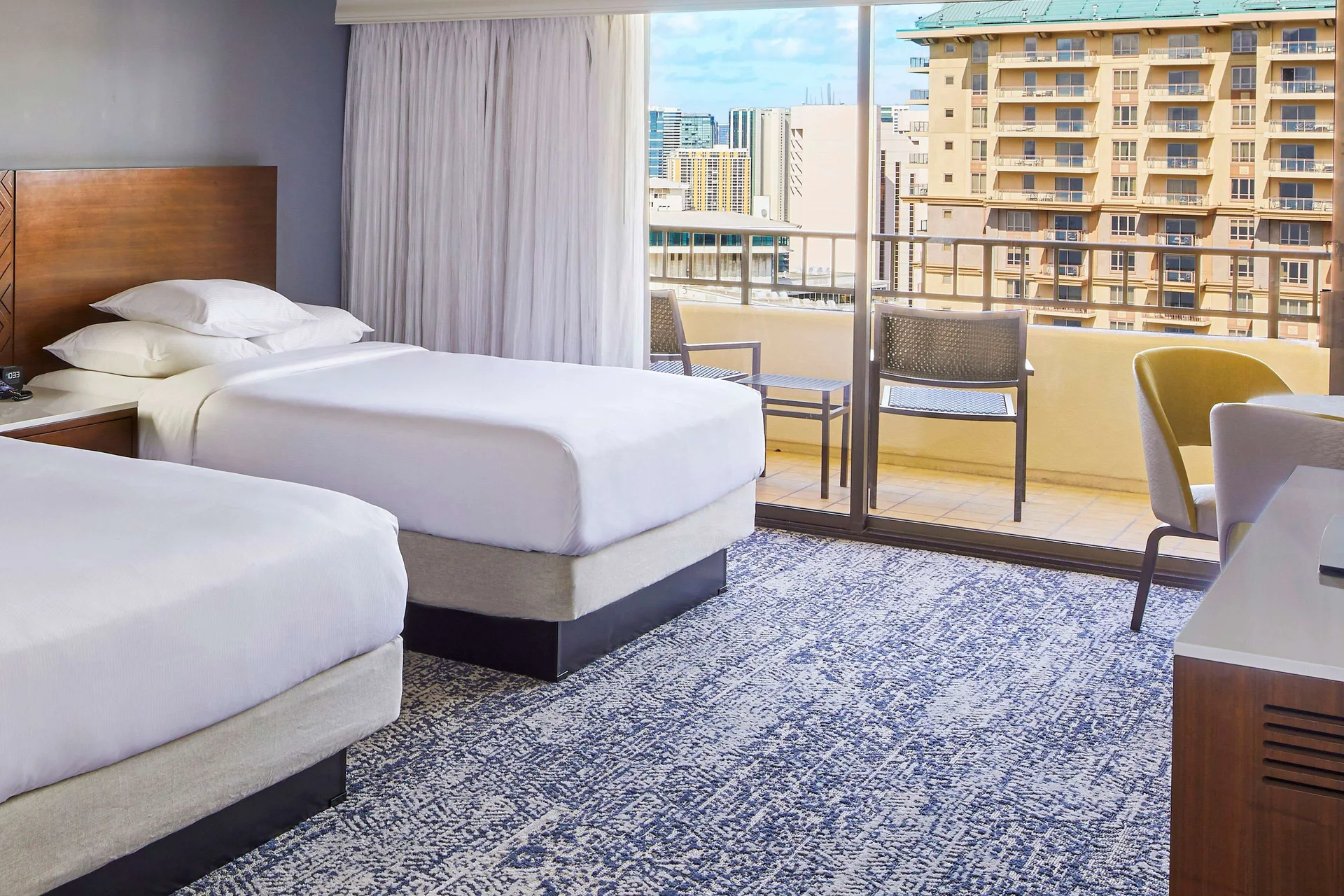 Two-bed Tapa Collection room with balcony at Hilton Hawaiian Village Waikiki Beach Resort.
