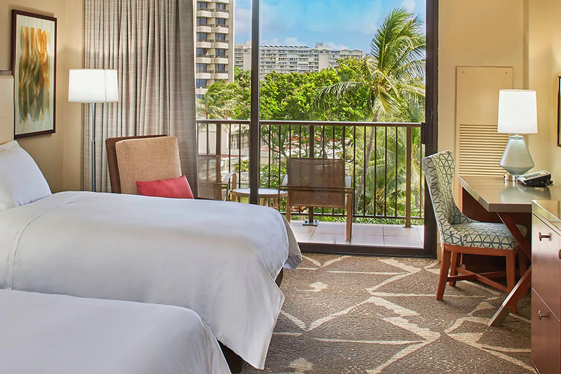 Resort view room with two beds and balcony at Hilton Hawaiian Village Waikiki Beach Resort.