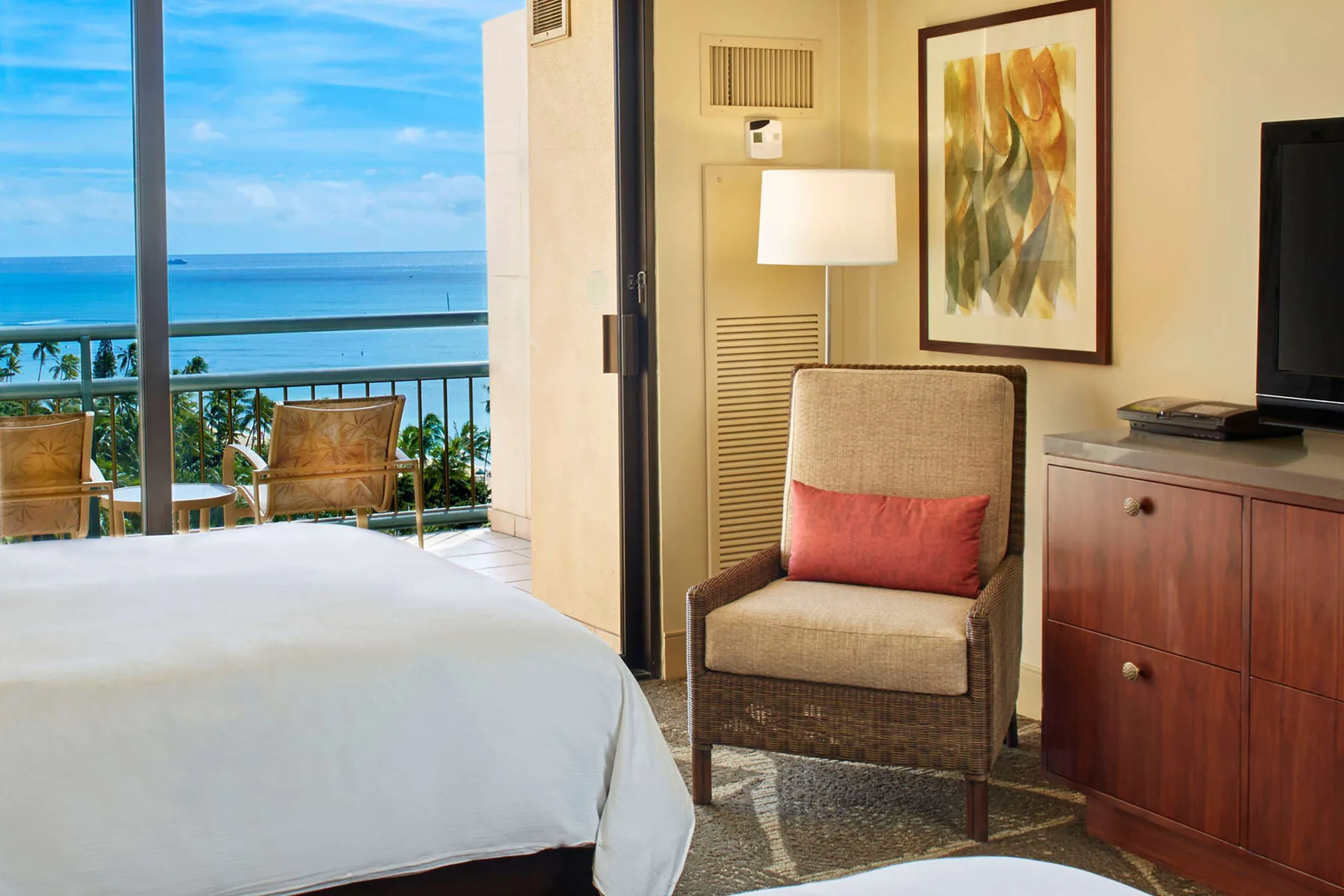 One Bedroom Ocean View Suite bedroom with king bed and ocean view at Hilton Hawaiian Village Waikiki Beach Resort Diamond Head Tower.