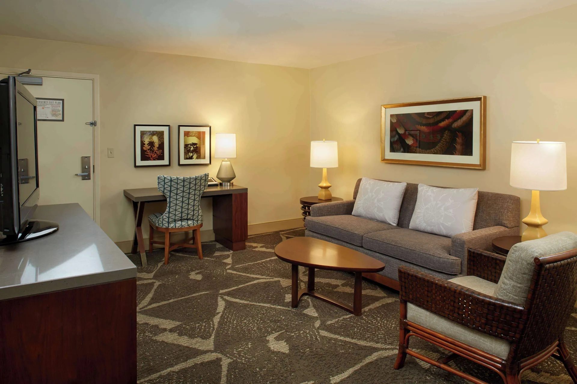 Living area of a one-bedroom ocean view suite at Hilton Hawaiian Village Waikiki Beach Resort.