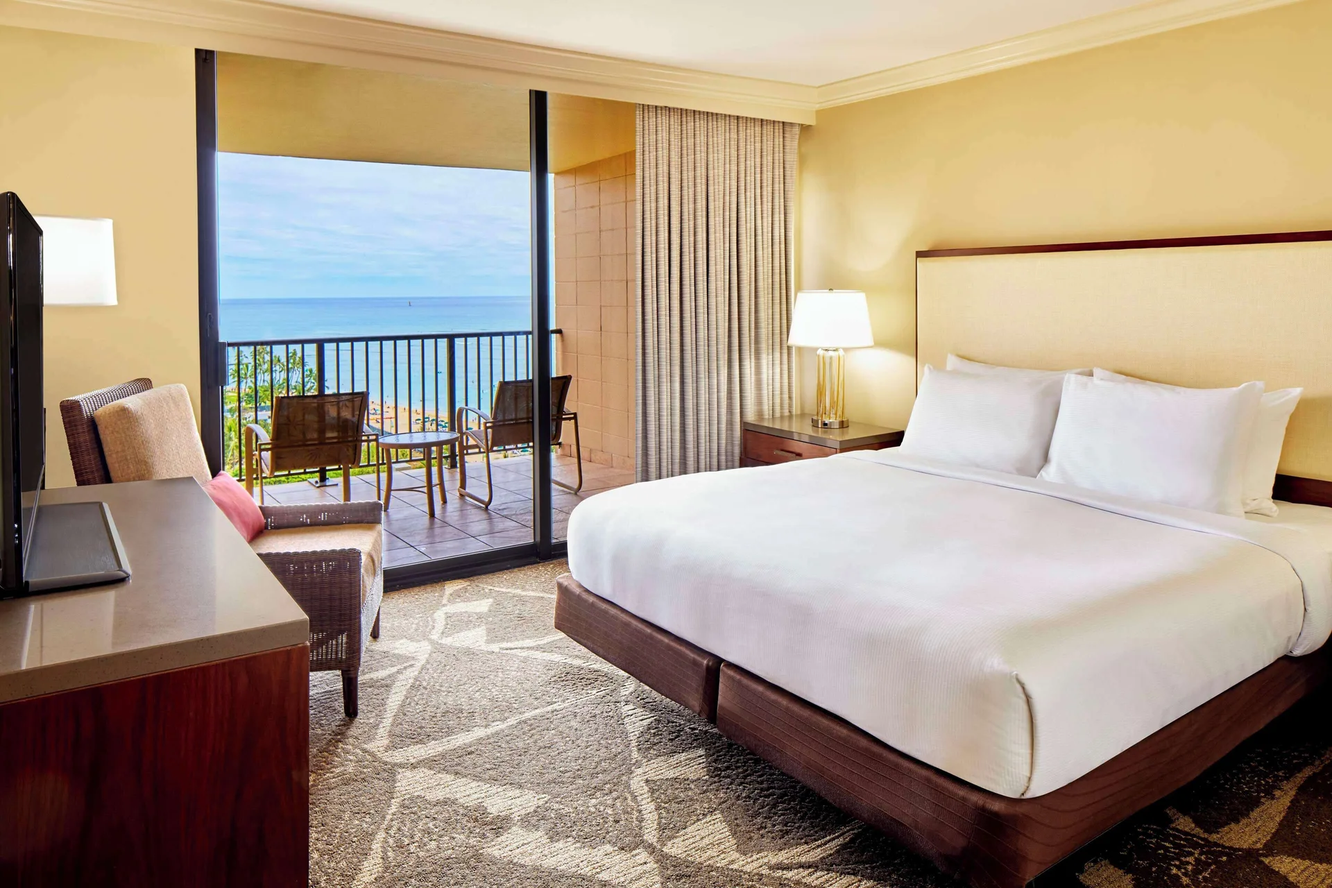 One Bedroom Suite Diamond Head Tower with king bed and balcony at Hilton Hawaiian Village Waikiki Beach Resort with roll-in shower accessibility.