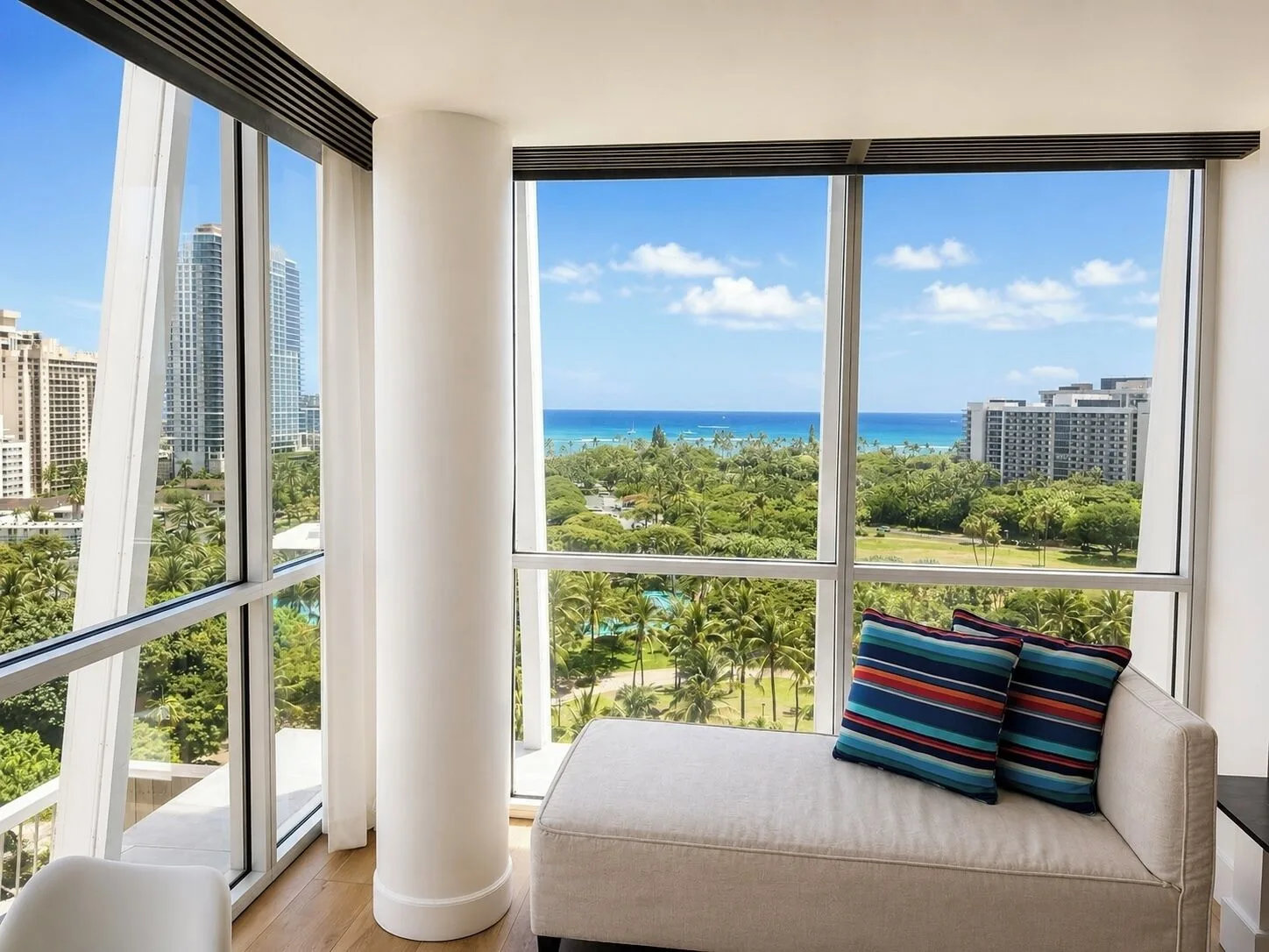 Window seating with ocean and skyline views in Penthouse Hoku Skyline Direct Oceanview at Hotel La Croix.