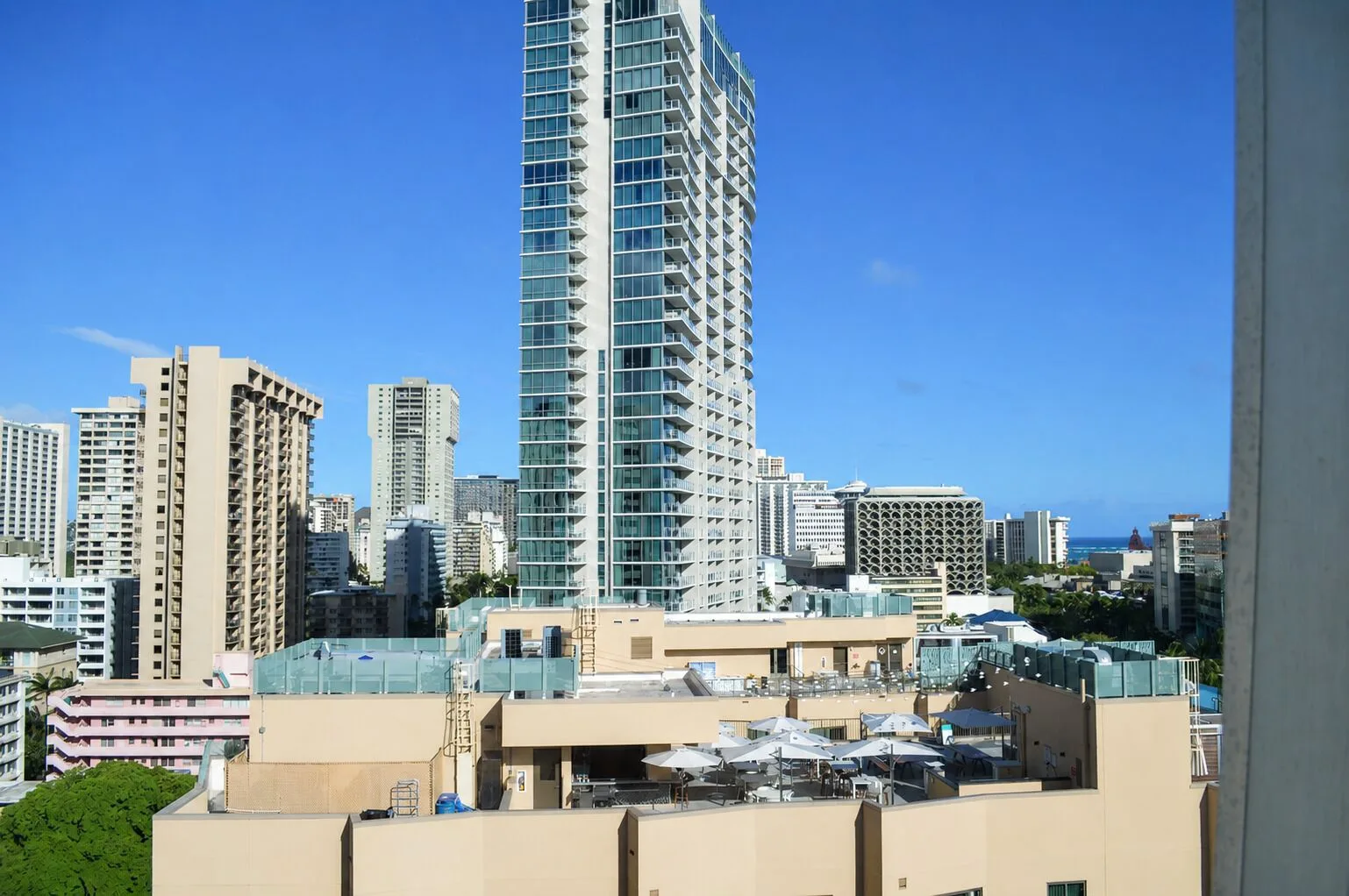 Honolulu skyline view from the Penthouse Hoku room at Hotel La Croix.