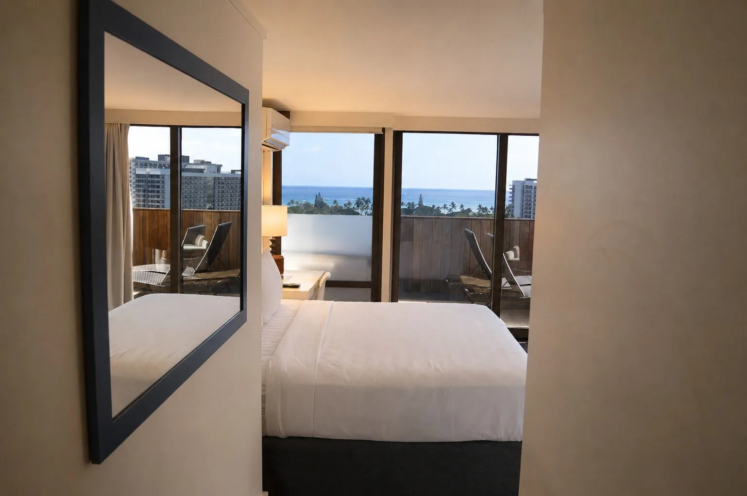 Bedroom entry view toward ocean-facing terrace in Penthouse Hoku Terrace at Hotel La Croix.