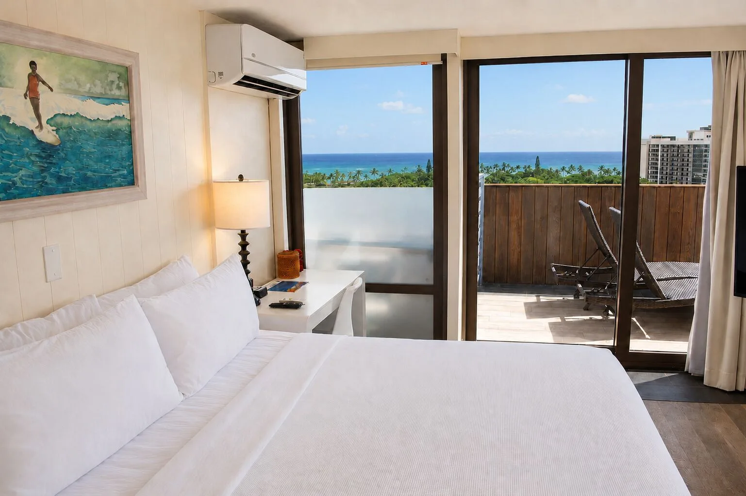 King bed opening to an oceanview terrace in Penthouse Hoku Terrace at Hotel La Croix.
