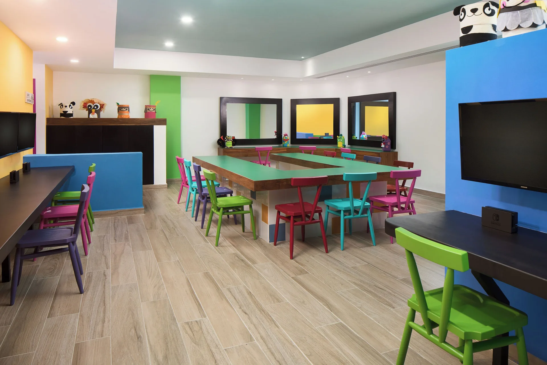 A colorful kids club activity room at Hotel Marina El Cid Spa & Beach Resort.