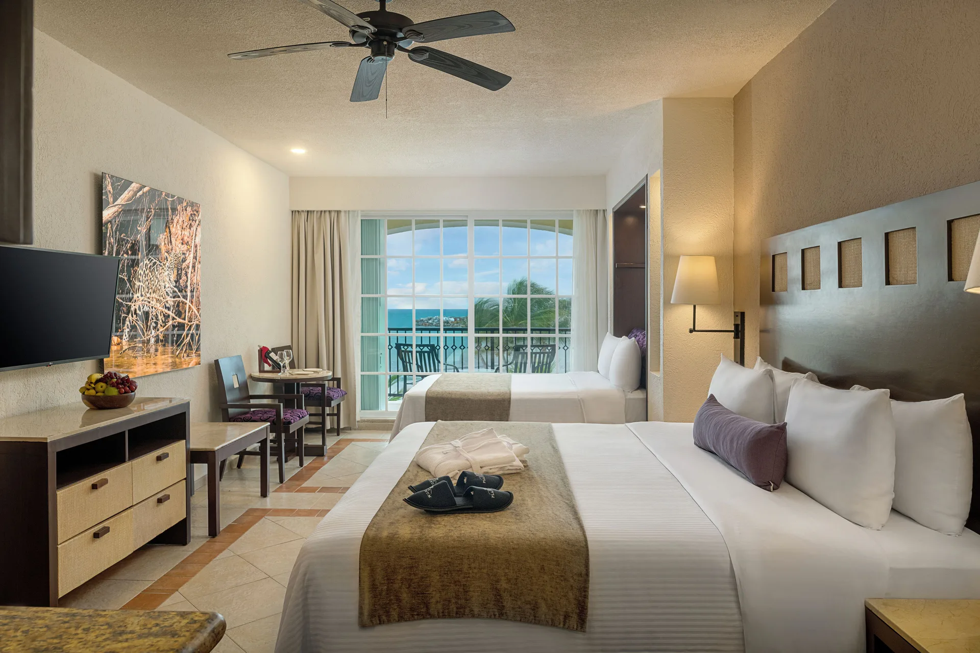 Junior Suite Platinum with two beds and balcony view at Hotel Marina El Cid Spa & Beach Resort.