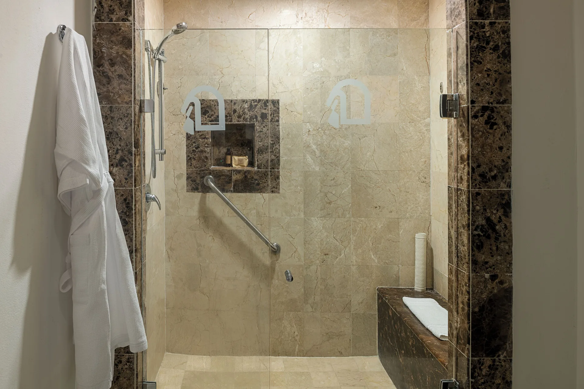 Luxury Room walk-in shower with glass door at Hotel Marina El Cid Spa & Beach Resort.