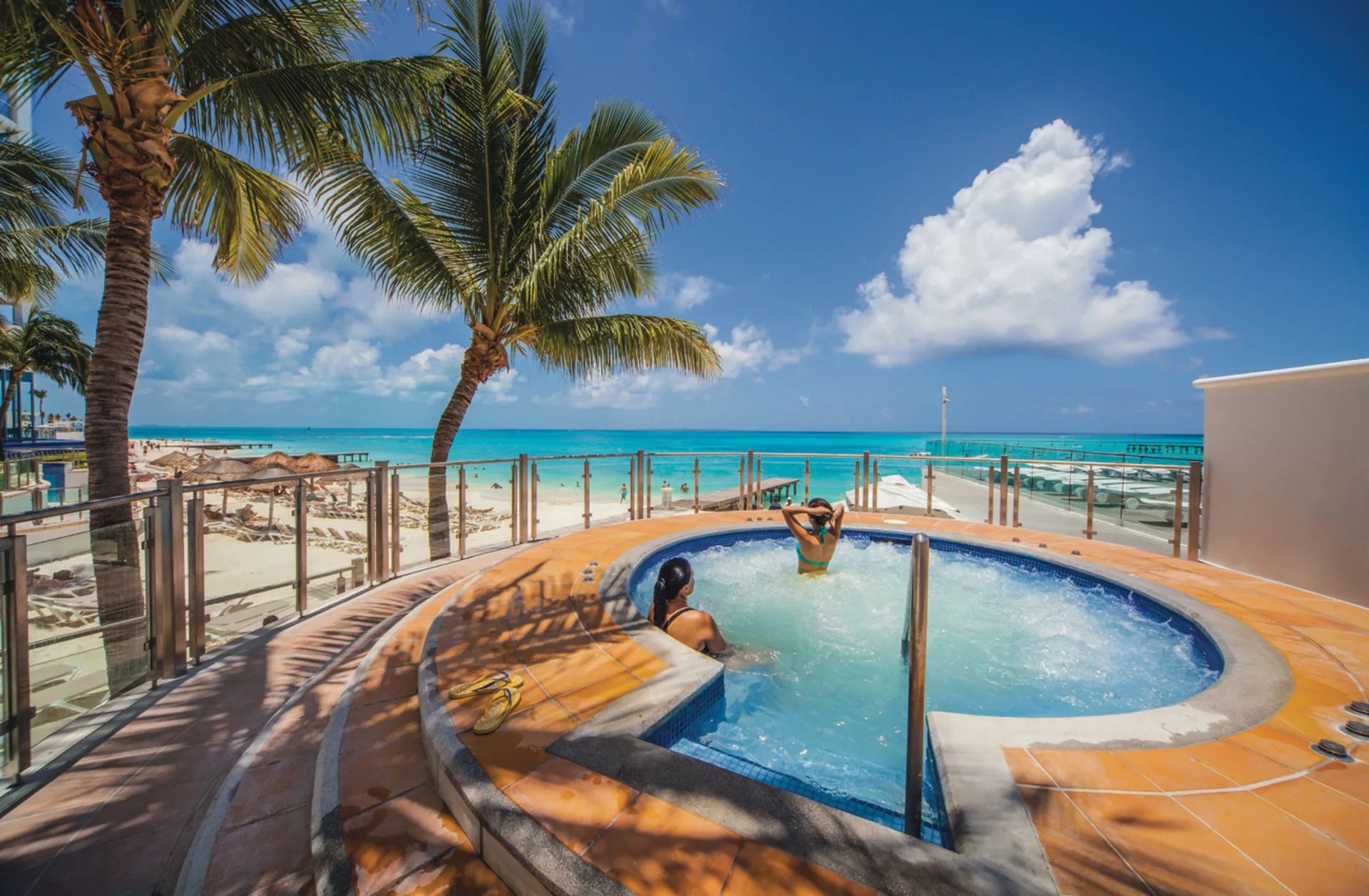 Circular whirlpool terrace overlooking the beach at Hotel Riu Cancun.