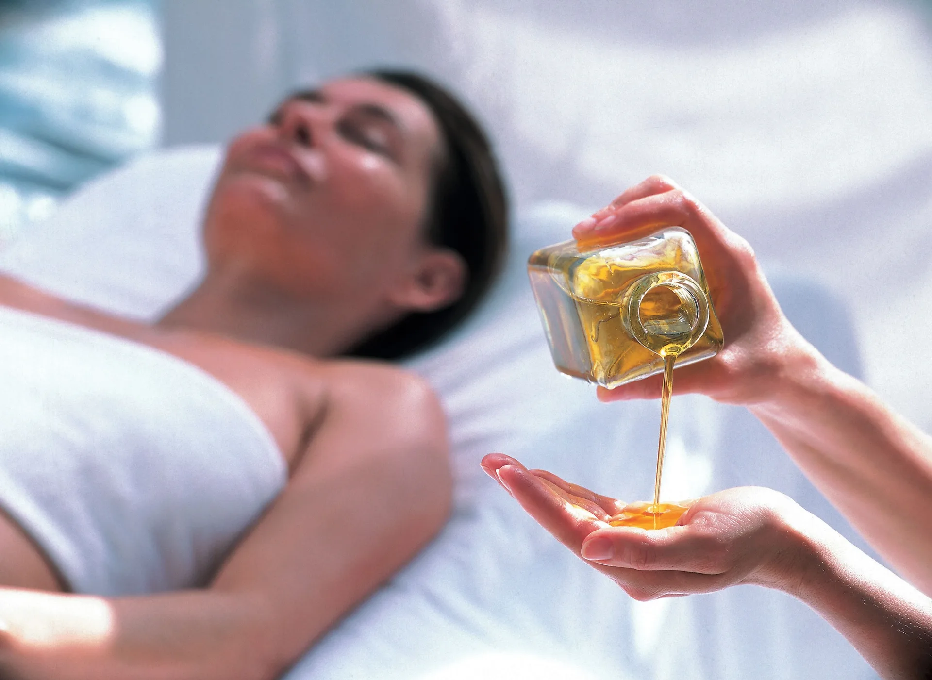 Massage oil being poured during a spa treatment at Hotel Riu Guanacaste.