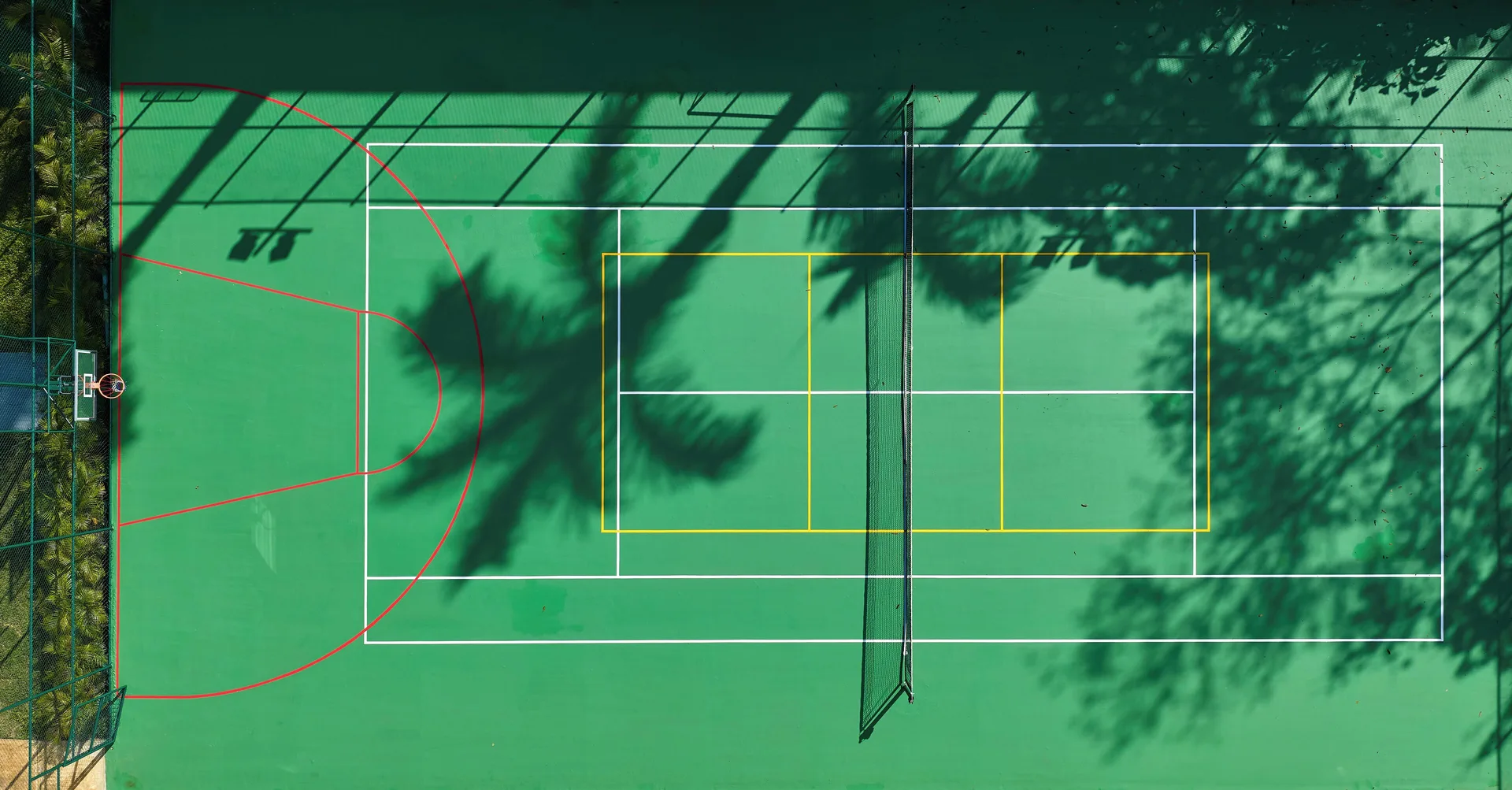 Aerial view of a green sports court at Hotel Riu Guanacaste.