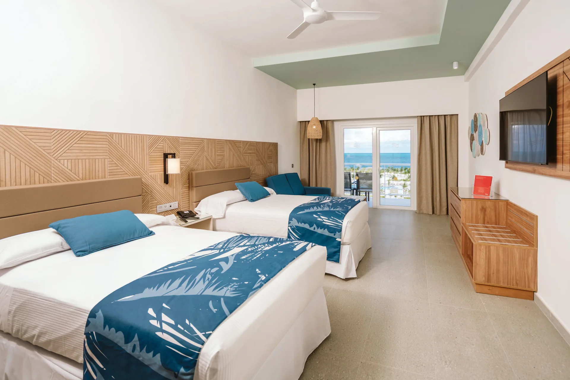 Ocean View Standard Room with two beds and balcony at Hotel Riu Latino.