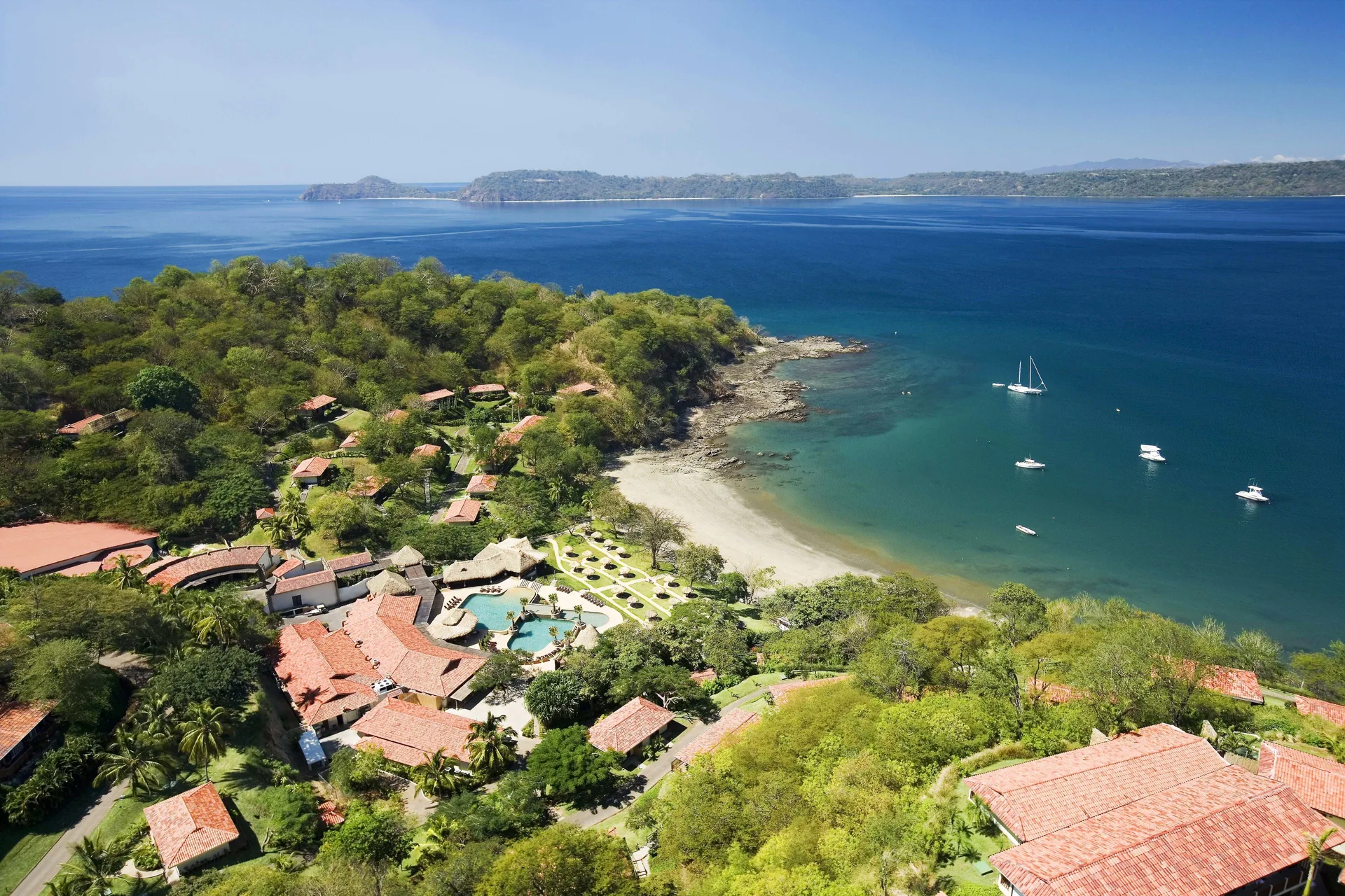Secrets Papagayo adults-only all-inclusive beach resort with romantic setting and tropical coastline