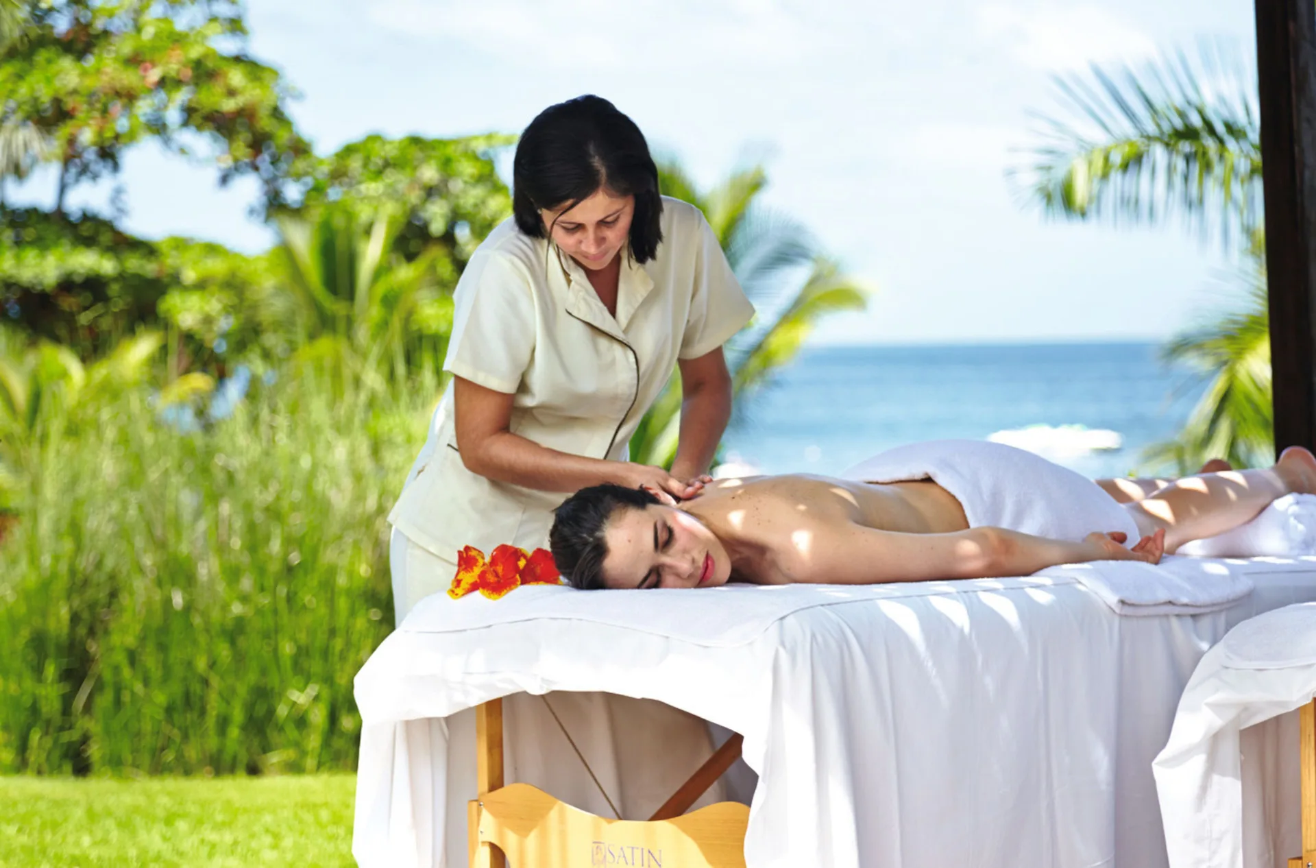 Outdoor massage by the ocean at Hotel Riu Palace Costa Rica.