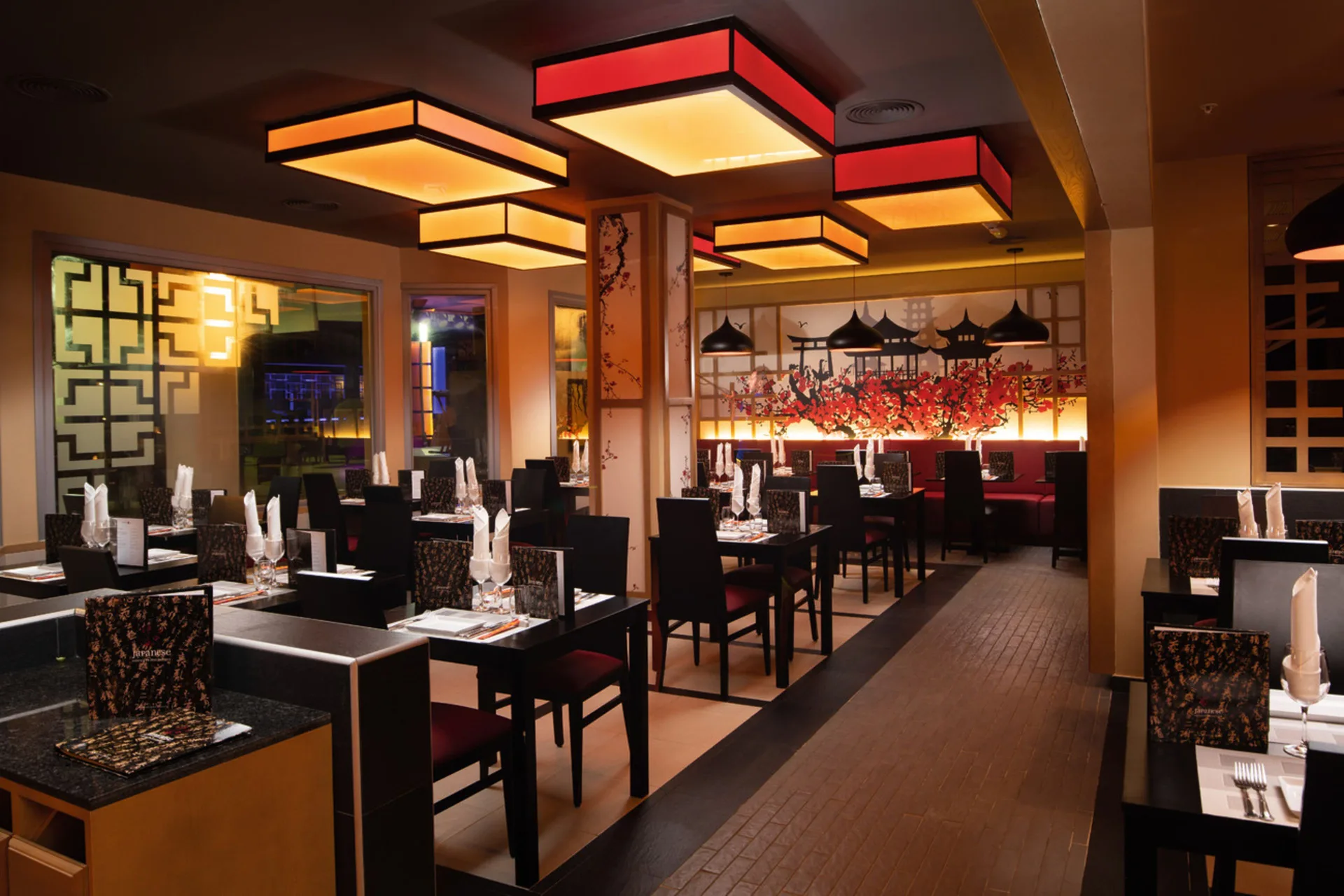 Japanese-style dining room with set tables at Hotel Riu Palace Tropical Bay.