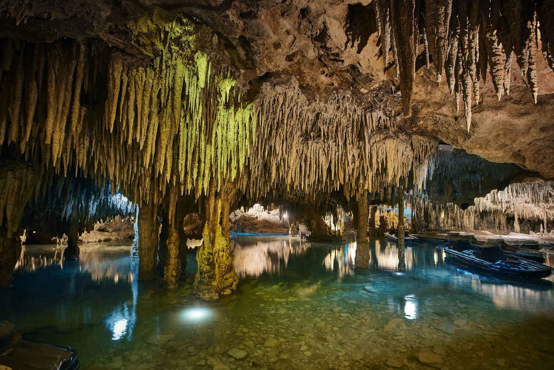 Underground cave river with stalactites near Hotel Xcaret Arte.