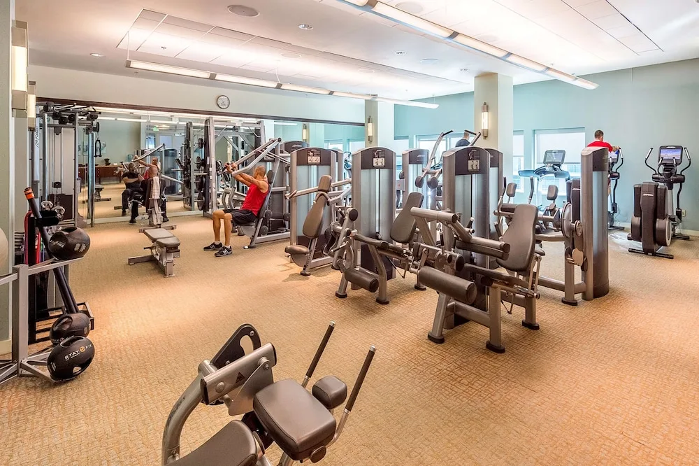 Fitness center with weight machines and cardio equipment at Hyatt Regency Trinidad.