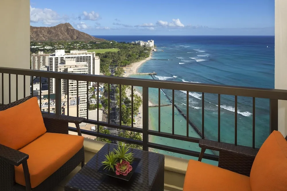 Balcony seating with Waikiki Beach and Diamond Head view at Hyatt Regency Waikiki Beach Resort & Spa.