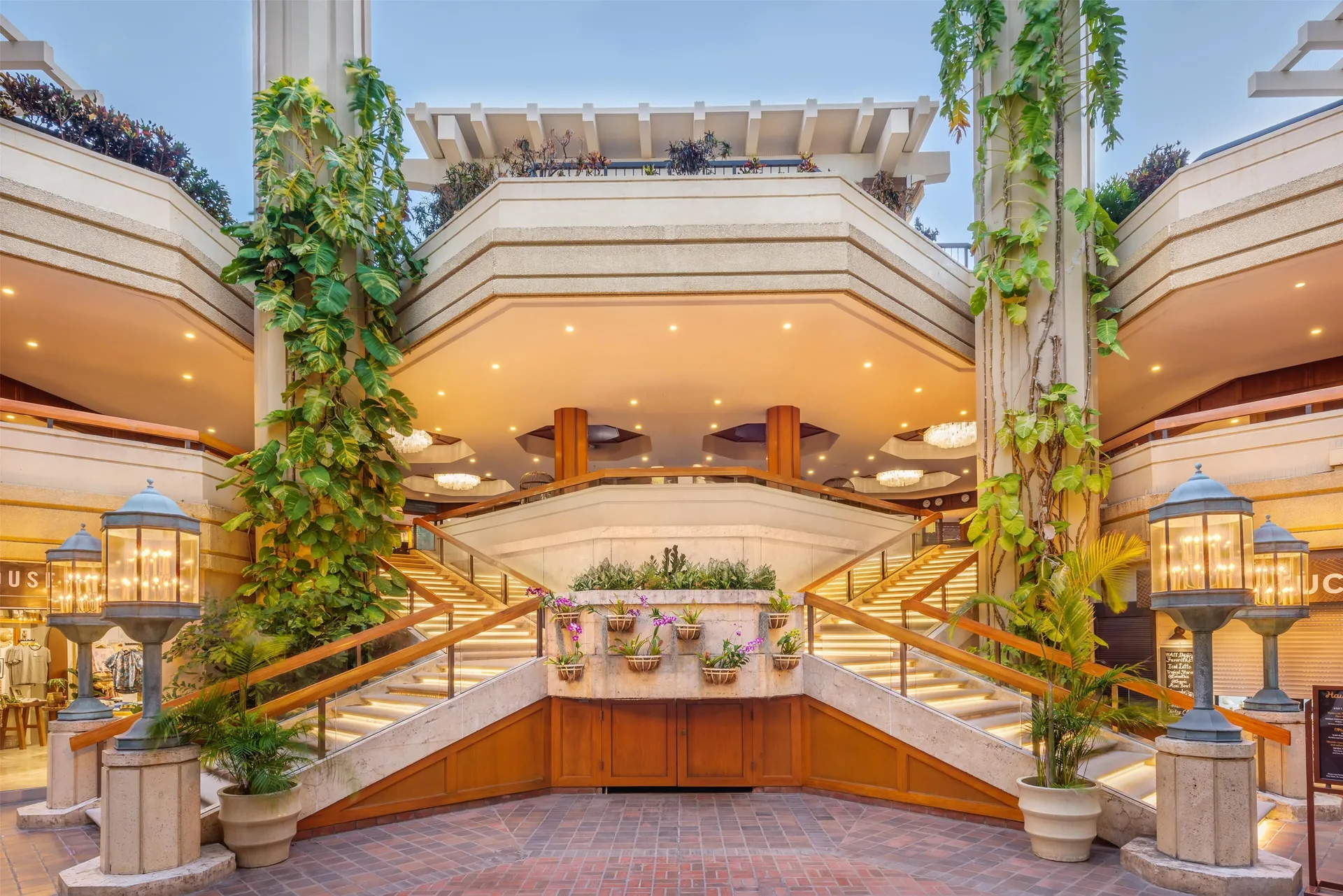 Grand atrium stairs and planted columns at Hyatt Regency Waikiki Beach Resort & Spa.