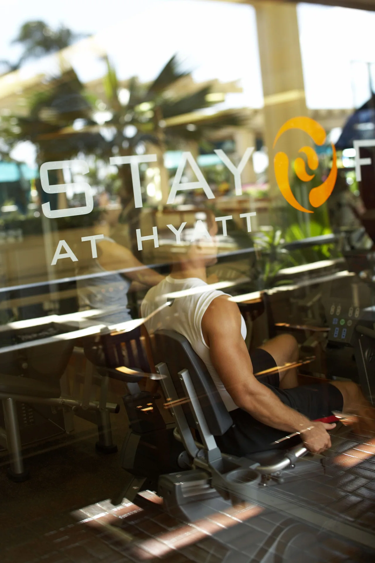 Fitness center window with STAY FIT sign at Hyatt Regency Waikiki Beach Resort & Spa.