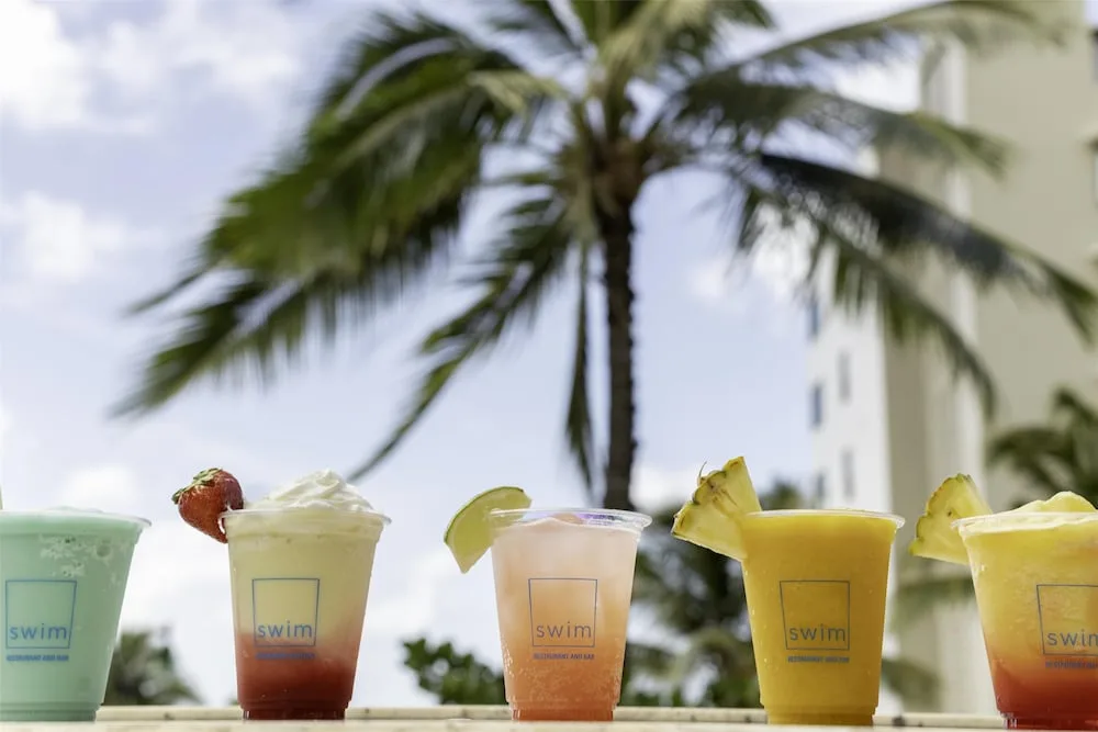 Colorful frozen drinks at SWIM at Hyatt Regency Waikiki Beach Resort & Spa.