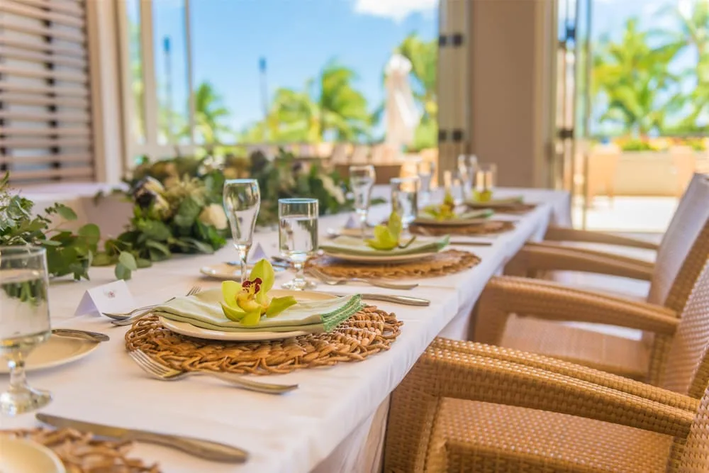 Tropical table setting with orchids at Hyatt Regency Waikiki Beach Resort & Spa.