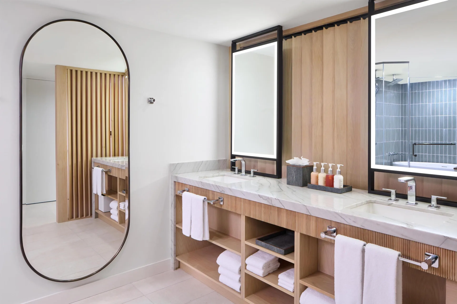 Double vanity bathroom in a deluxe suite at Hyatt Regency Waikiki Beach Resort & Spa.