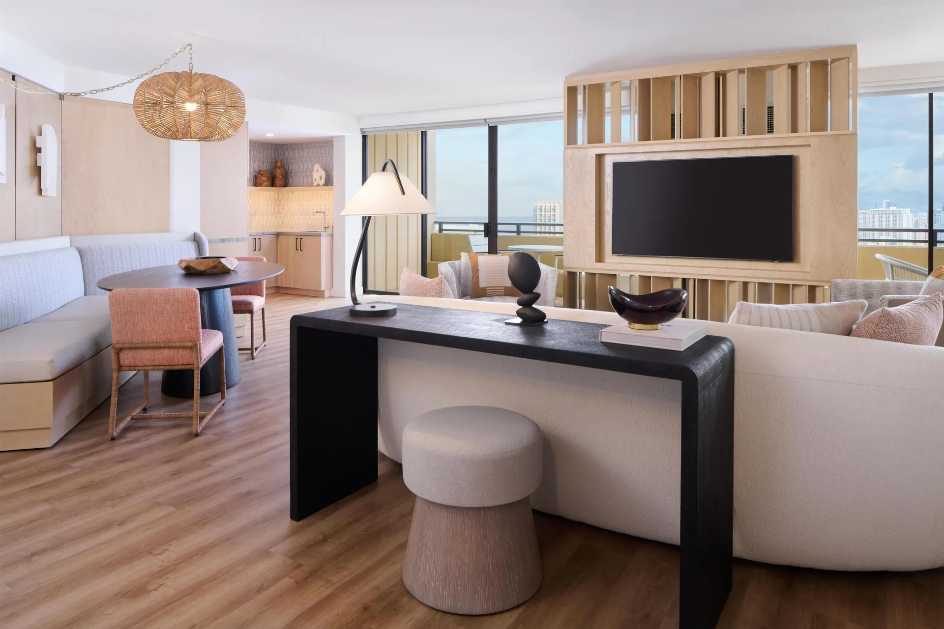 Ocean view deluxe suite living and dining area at Hyatt Regency Waikiki Beach Resort & Spa.