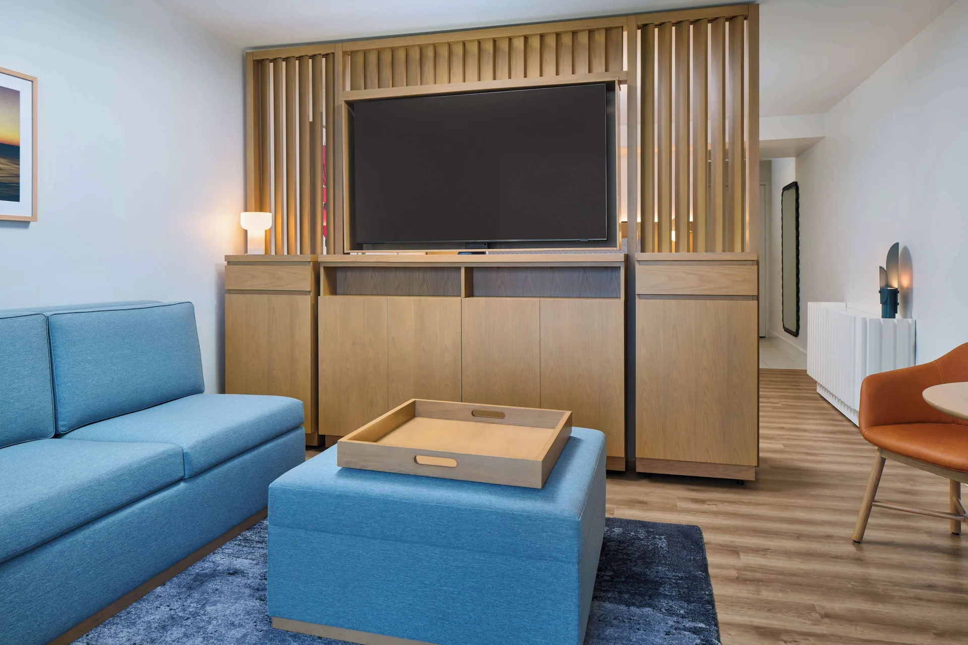 Living area of a Junior Suite with sofa bed at Hyatt Regency Waikiki Beach Resort & Spa.