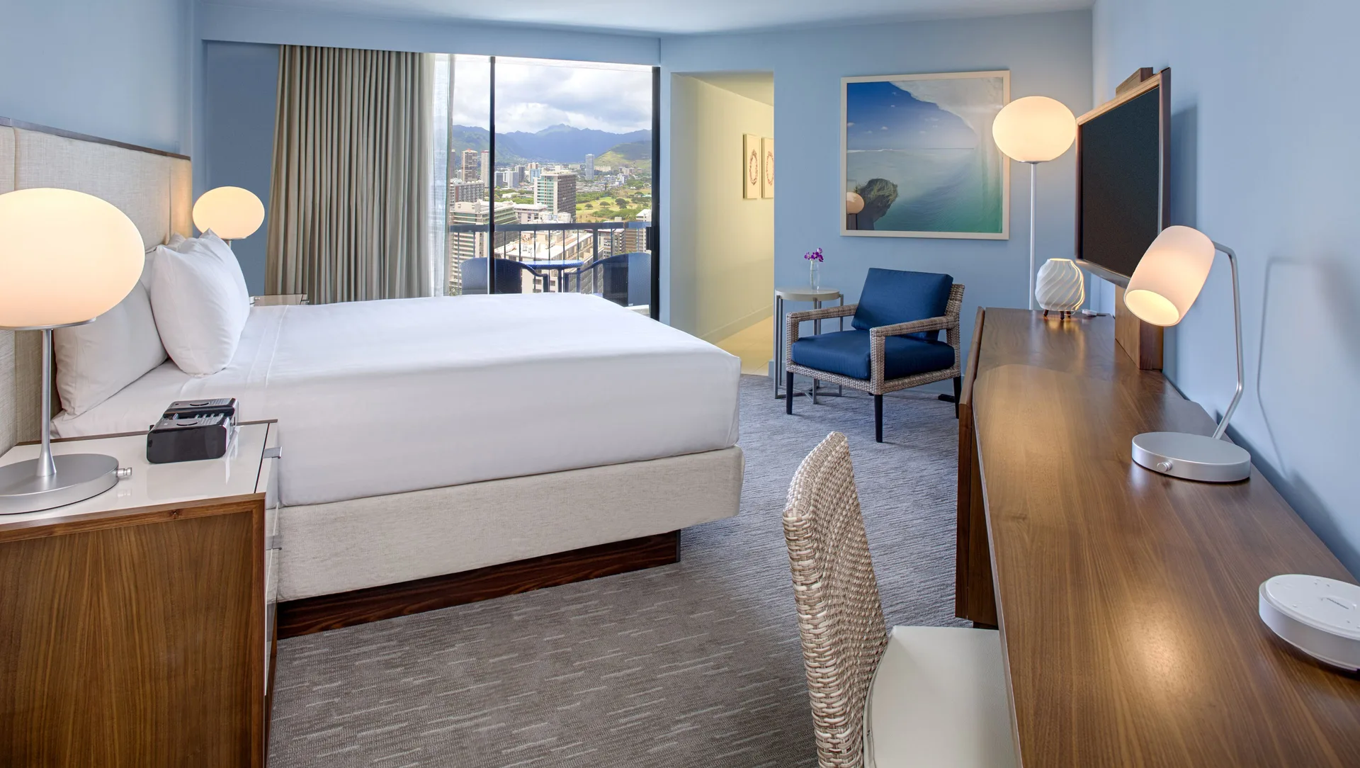 Accessible guest room with king bed and balcony view at Hyatt Regency Waikiki Beach Resort & Spa.