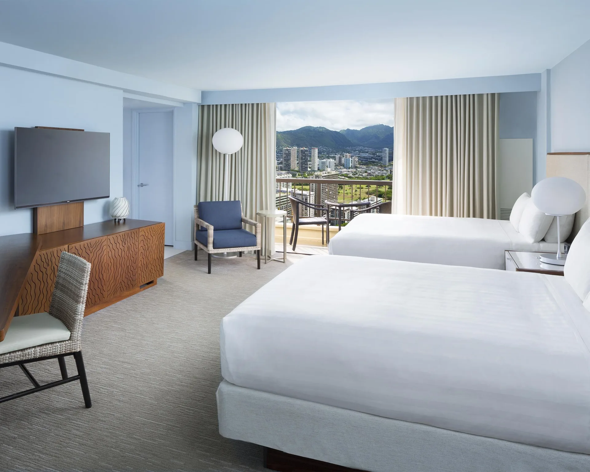 Two-bed city view room with balcony at Hyatt Regency Waikiki Beach Resort & Spa.