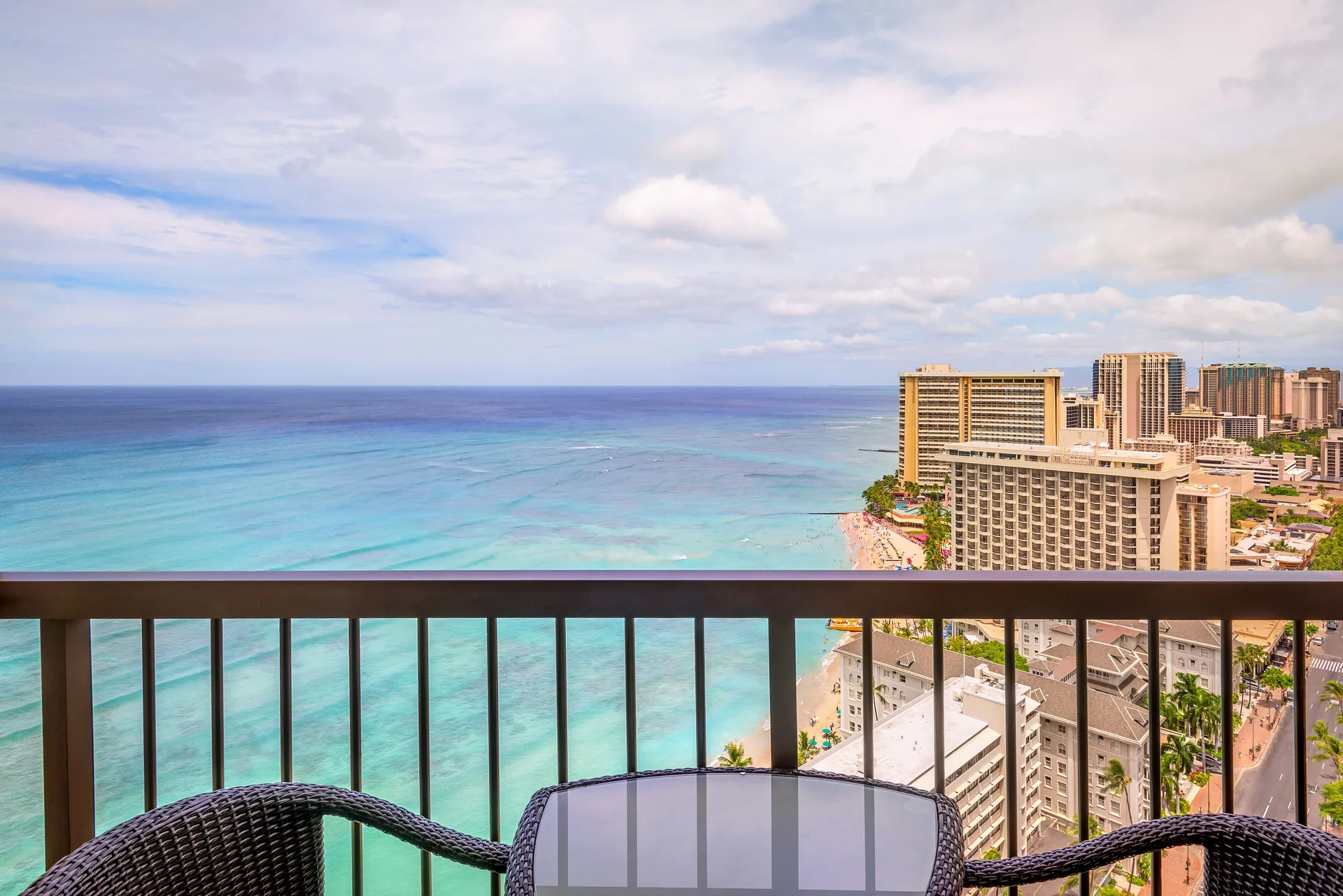 Ocean view balcony seating at Hyatt Regency Waikiki Beach Resort & Spa overlooking Waikiki Beach.