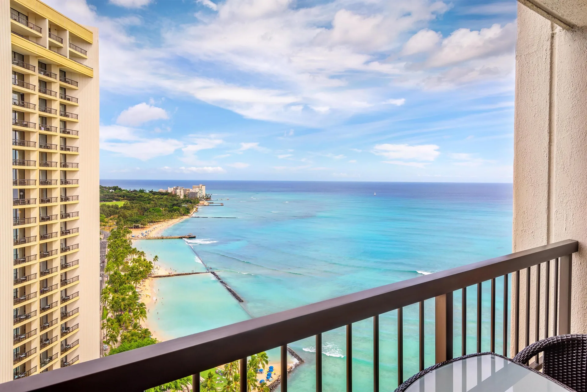 Ocean view balcony at Hyatt Regency Waikiki Beach Resort & Spa overlooking beach and water.